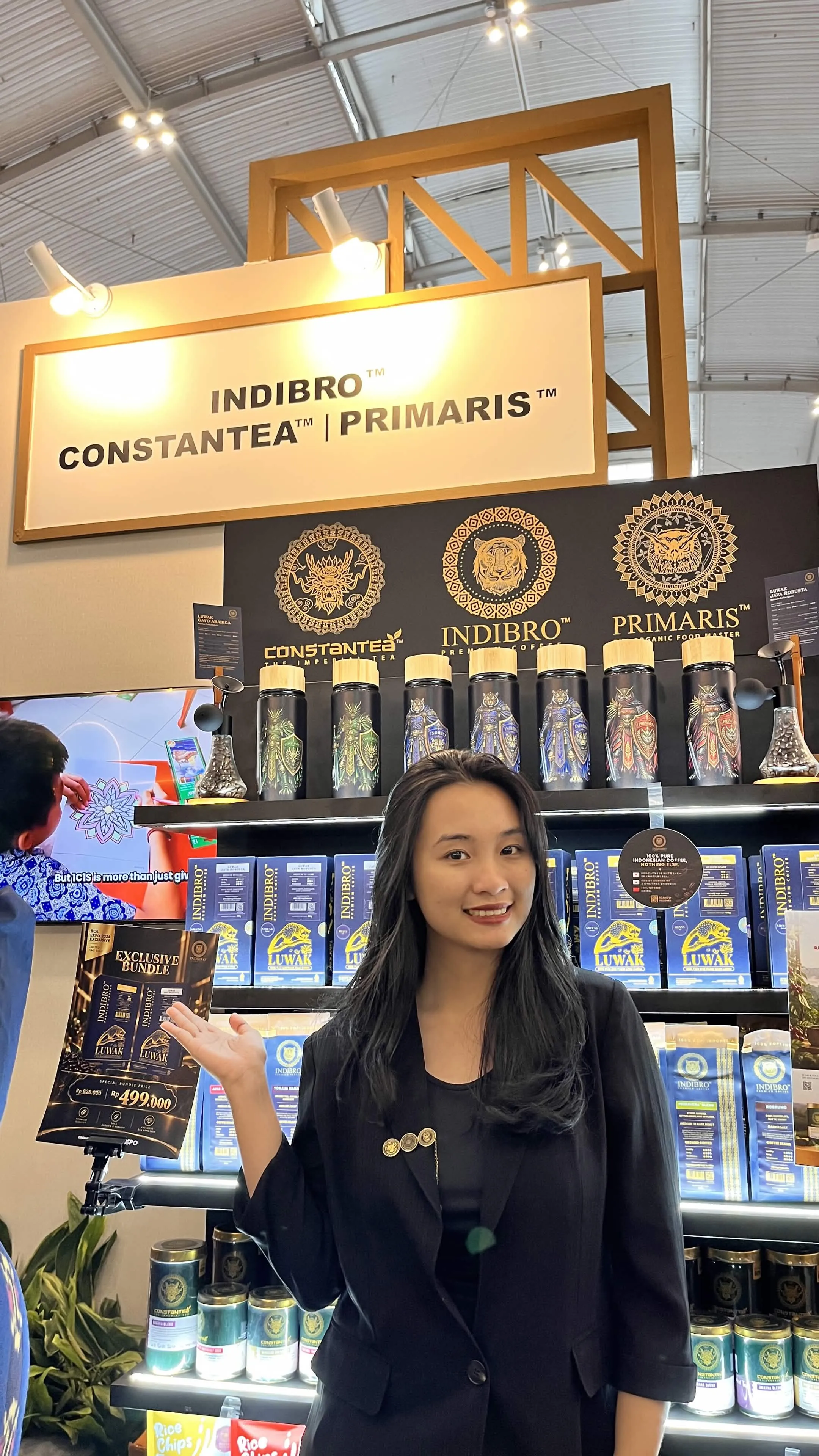 Cindy at a product display during a BCA event